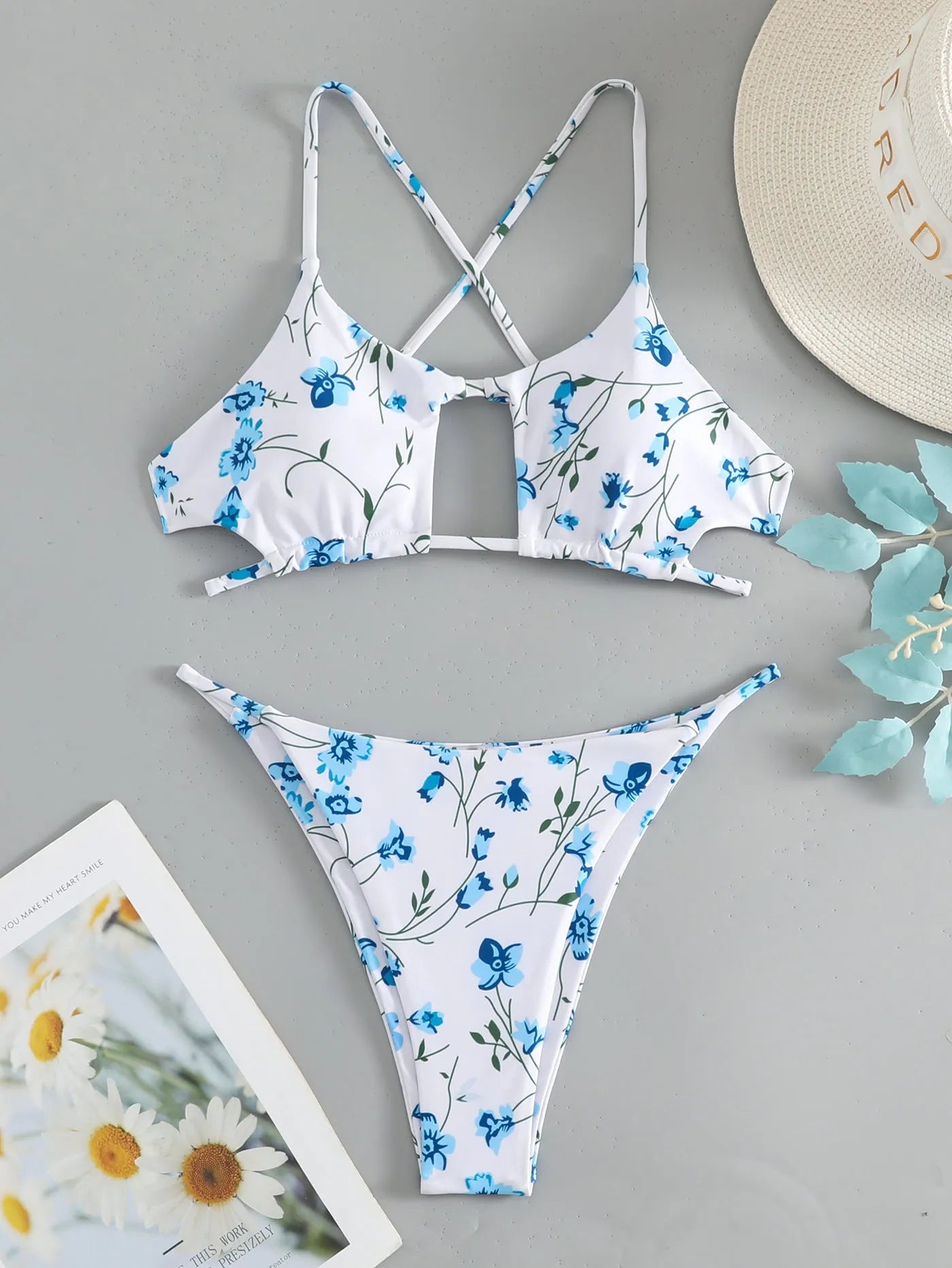 Women's floral pattern swimsuit with tie-neck triangle top and matching shorts