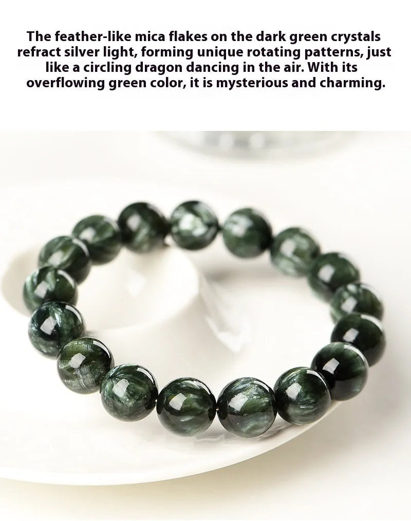 Grade 7A Green Dragon Crystal bracelet with round beads and ruyi design on a wrist.