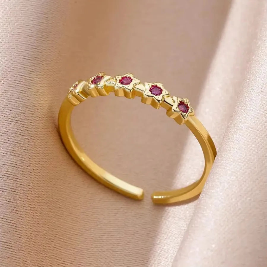 18K gold plated copper open mouth ring with synthetic zircon love emerald motif on white background