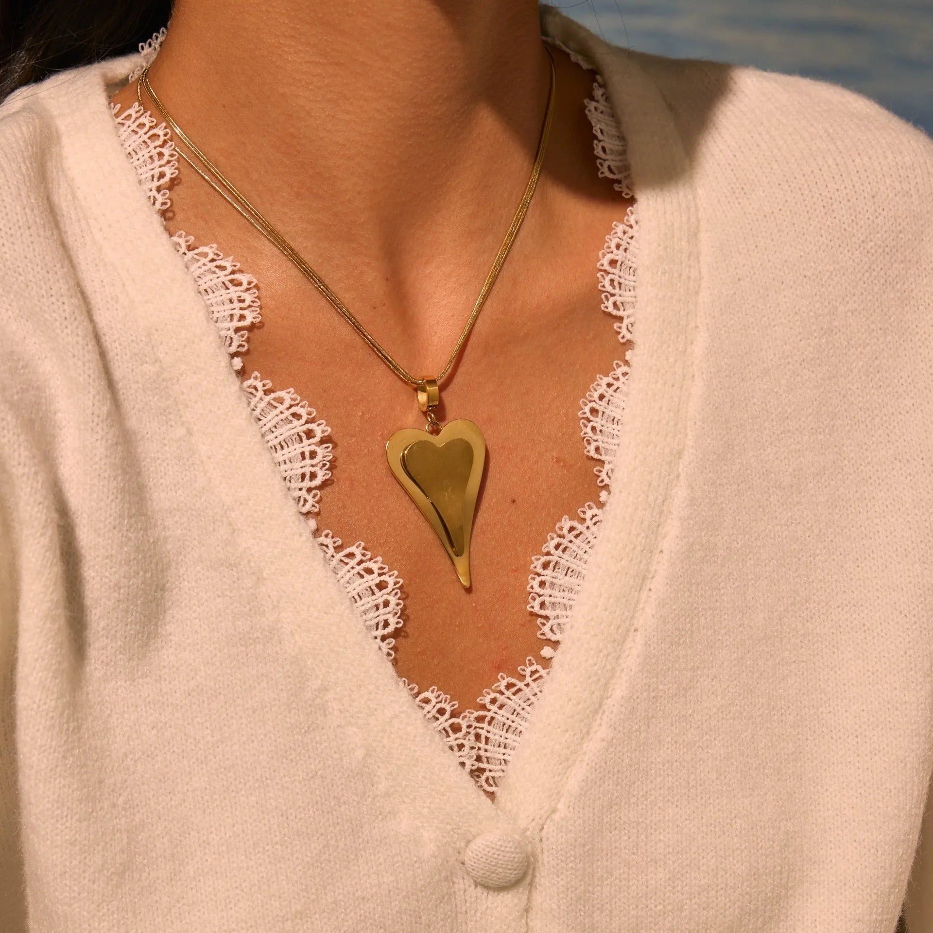 Double heart snake bones chain necklace in stainless steel with geometric pendant design