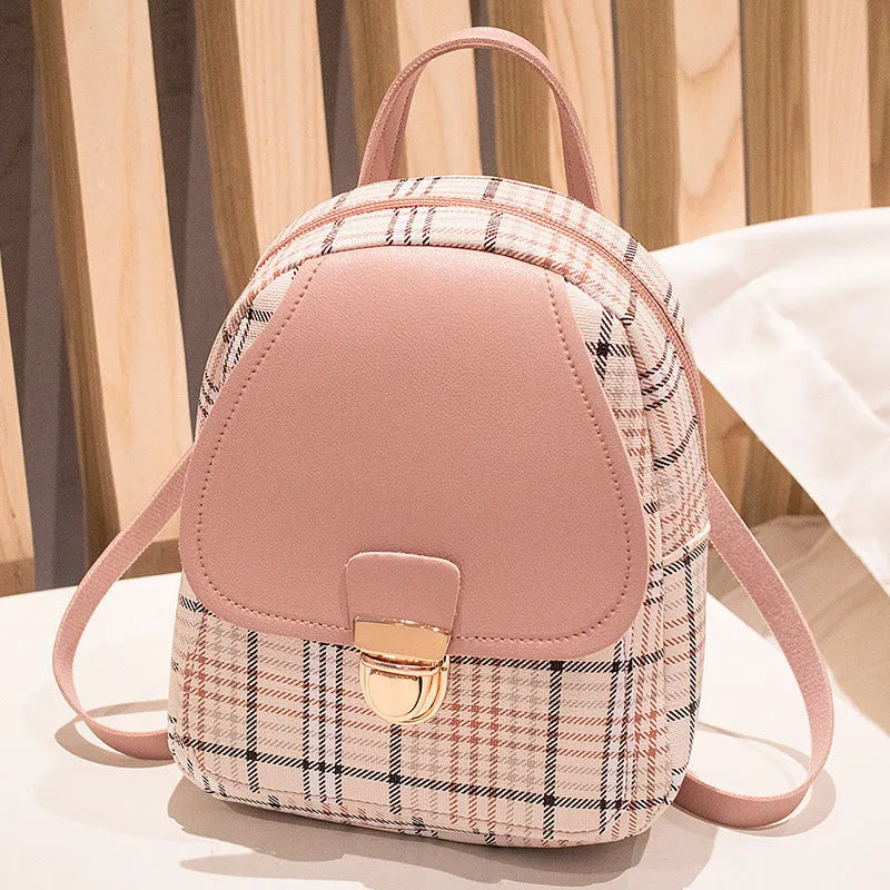 Diagonal cut one shoulder phone bag in PU fabric available in five colours.