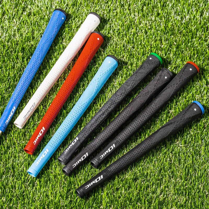 TPE golf club grip in assorted colours including pink, red, and black with blue head on a club shaft.