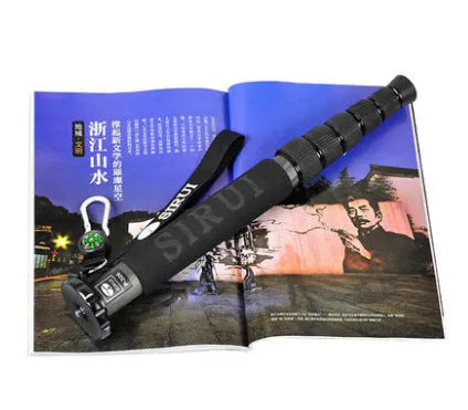 Black carbon fibre telescopic monopod for DSLR cameras, shown extended and collapsed.