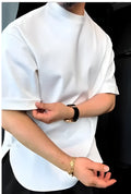 White men's buttoned round hem T-shirt made of combed cotton, laid flat showing front placket detail.