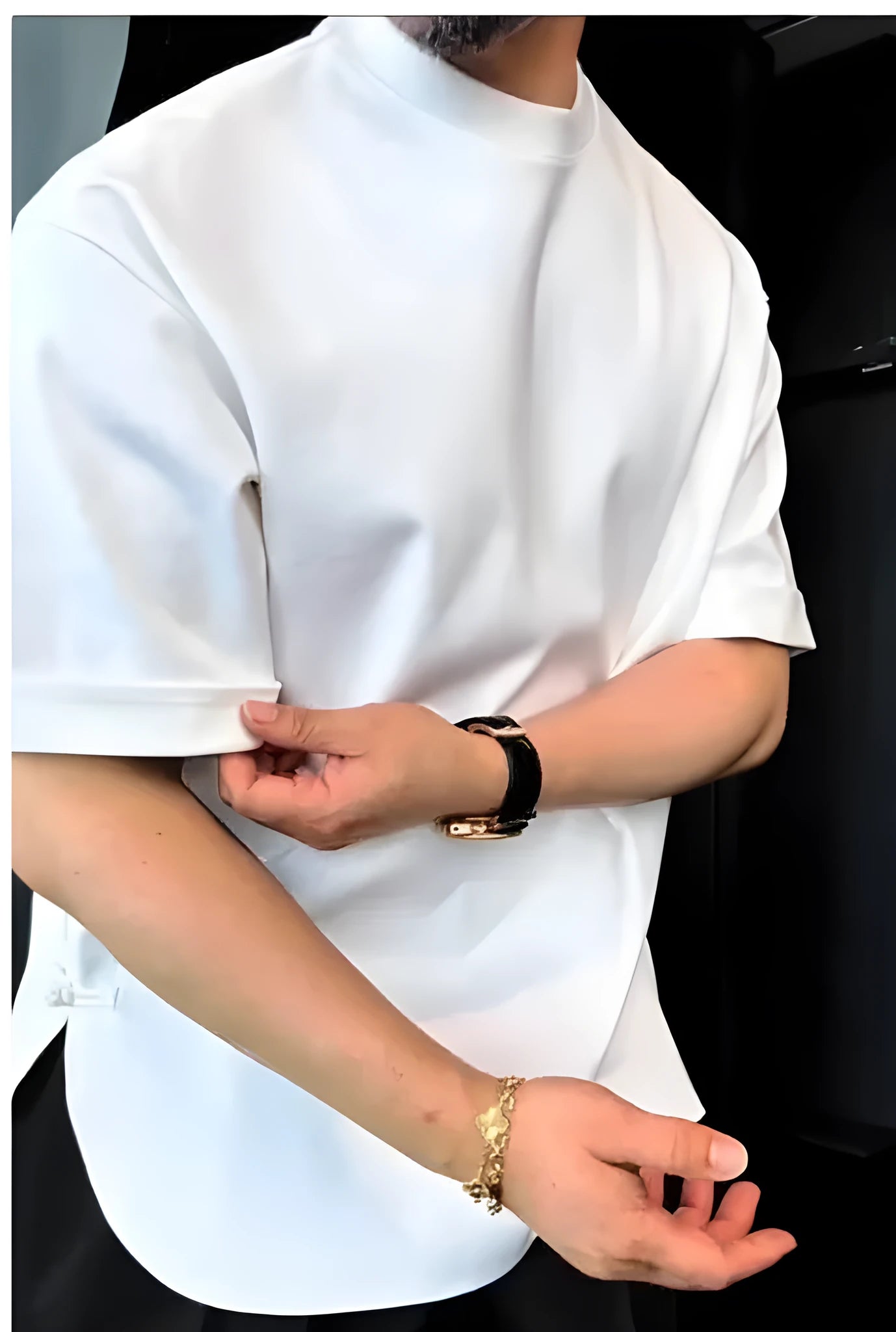 White men's buttoned round hem T-shirt made of combed cotton, laid flat showing front placket detail.