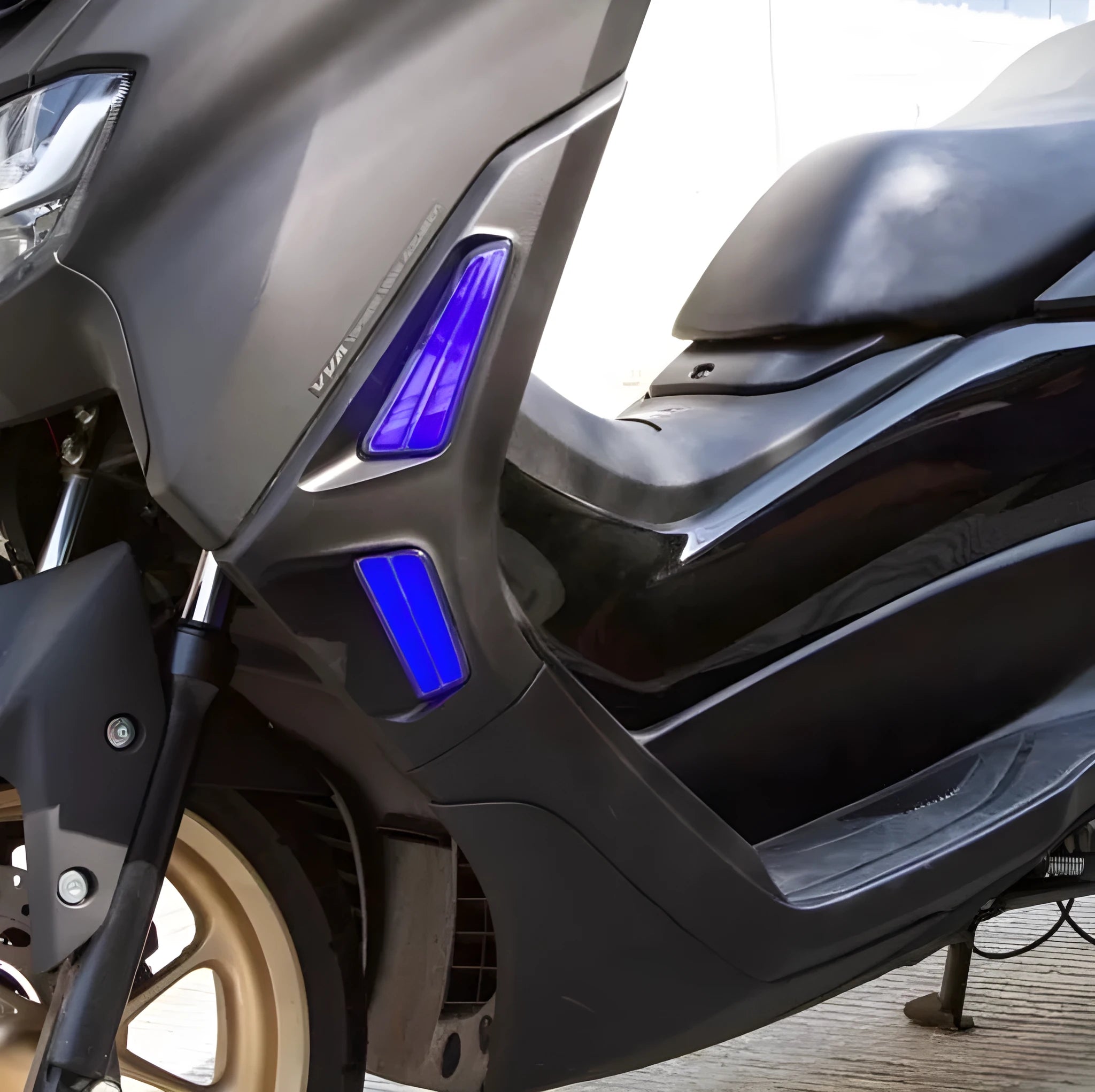Pair of LED light strips for Yamaha NMAX155 scooter in white, blue, or red with yellow turn signal section.