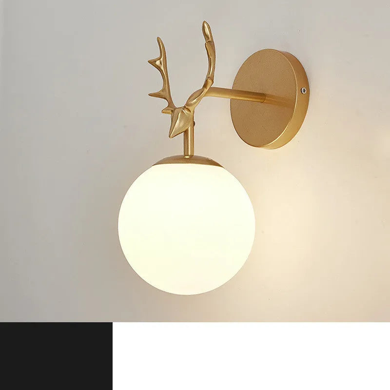 Modern round glass wall lamp with textured shade mounted on a white wall, showing E27 bulb holder.