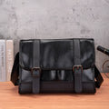 Black Korean style men's commuter backpack with anti-theft features and visible sewing thread detailing