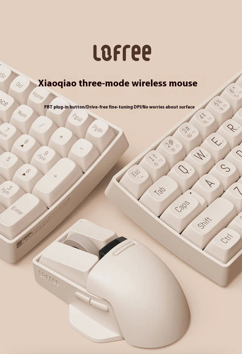 Xiaoqiao Tofu coloured three-mode wireless mouse with ergonomic shape on a desk.