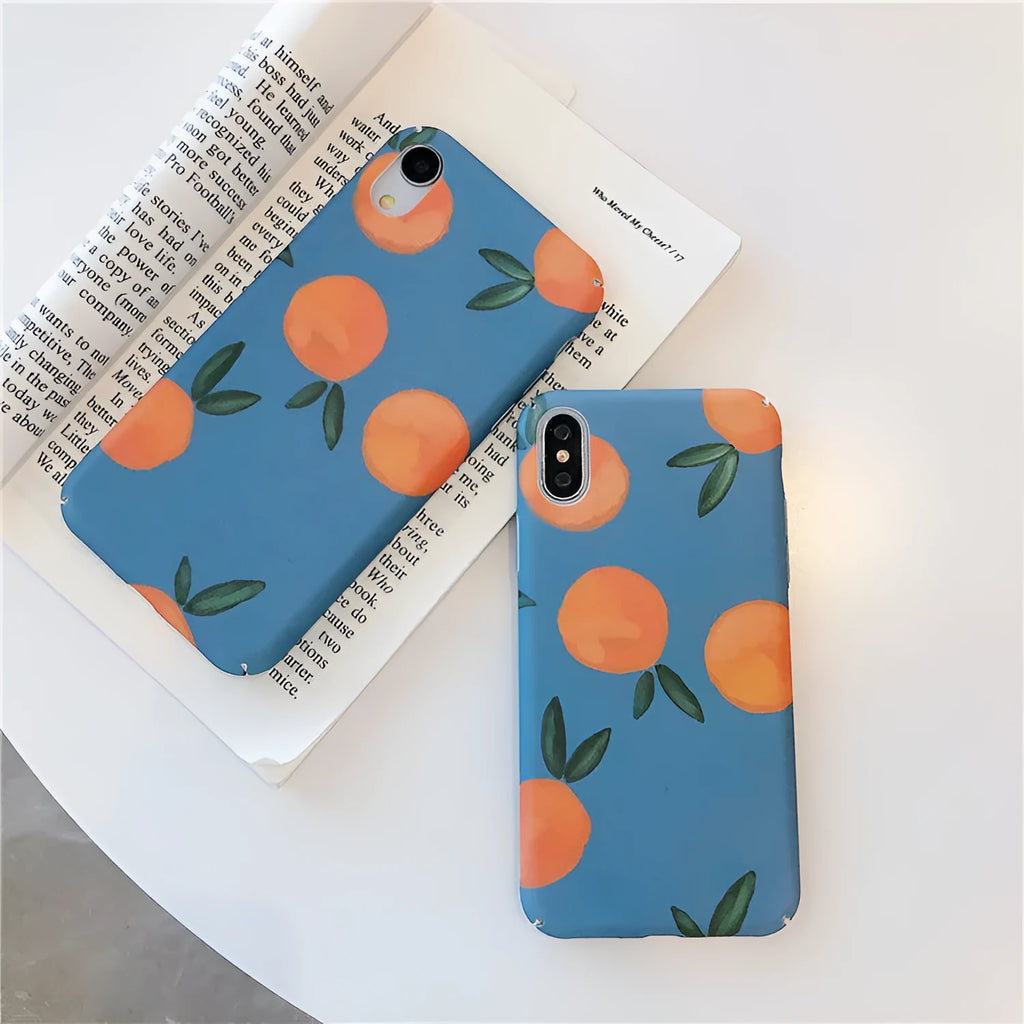 Plastic iPhone case with retro orange fruit and water design on blue background.