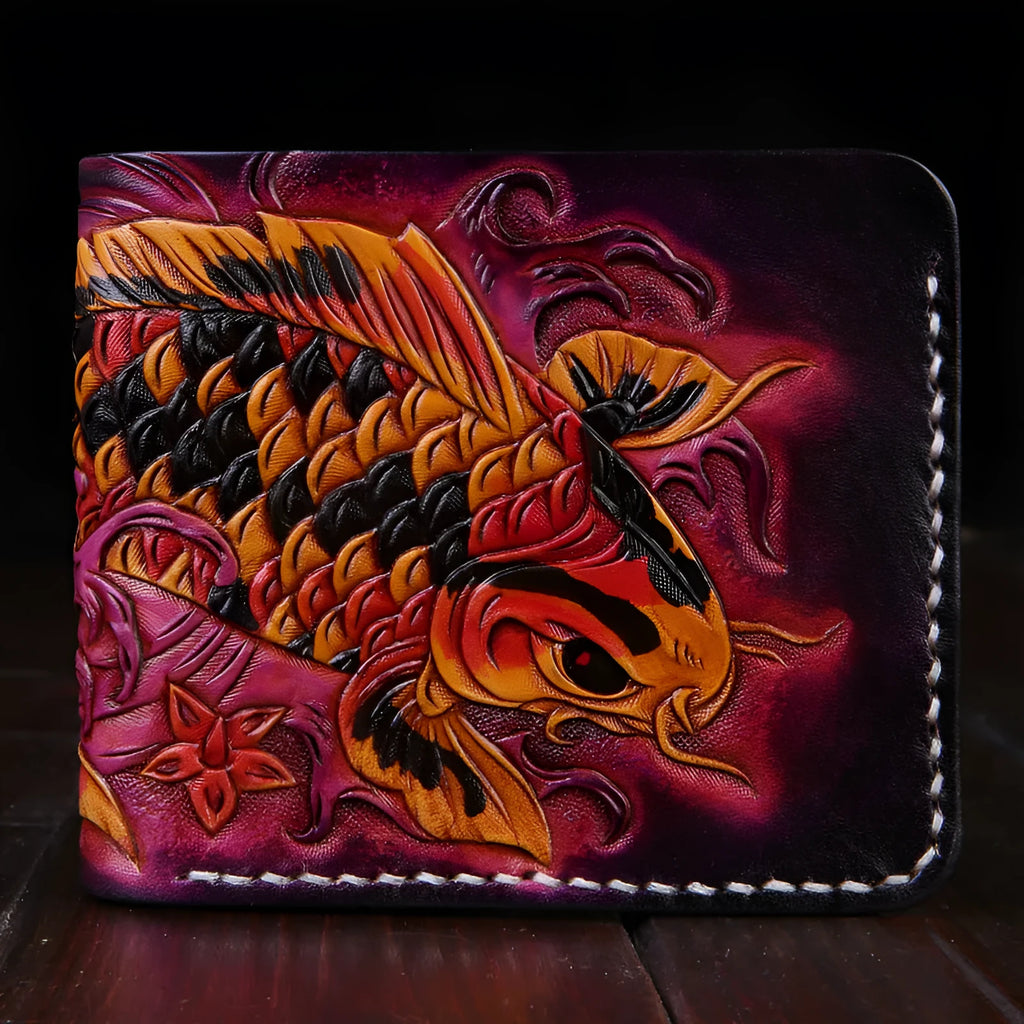 Hand-carved men's leather wallet in navy blue, showing slim profile and open design on a wooden table.