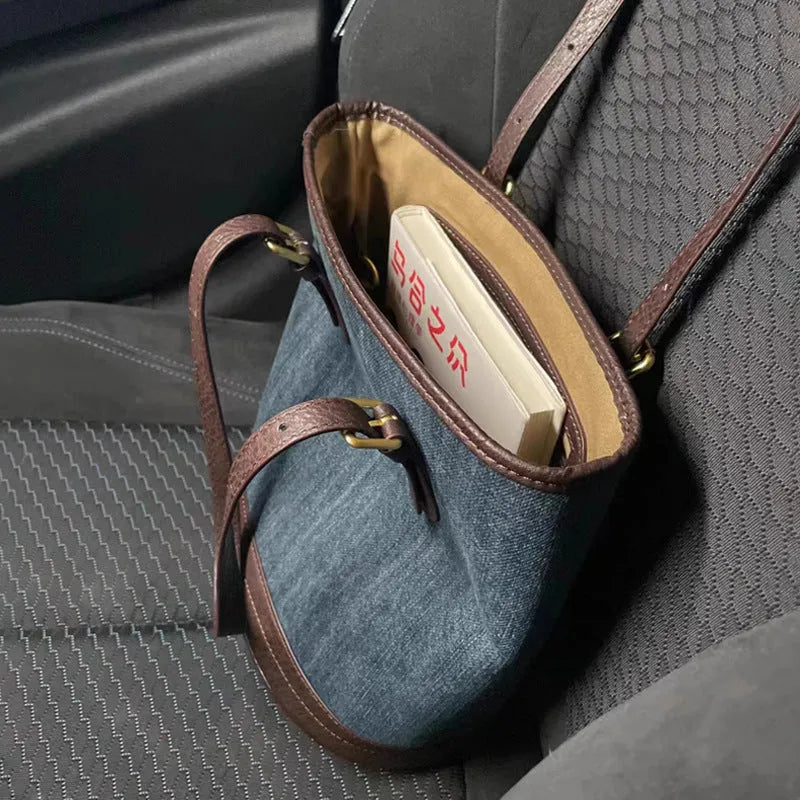 Retro denim patchwork one-shoulder bucket handbag in denim colour.