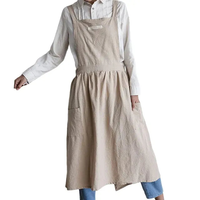 Cotton plain sleeveless kitchen apron in blue colour on white background