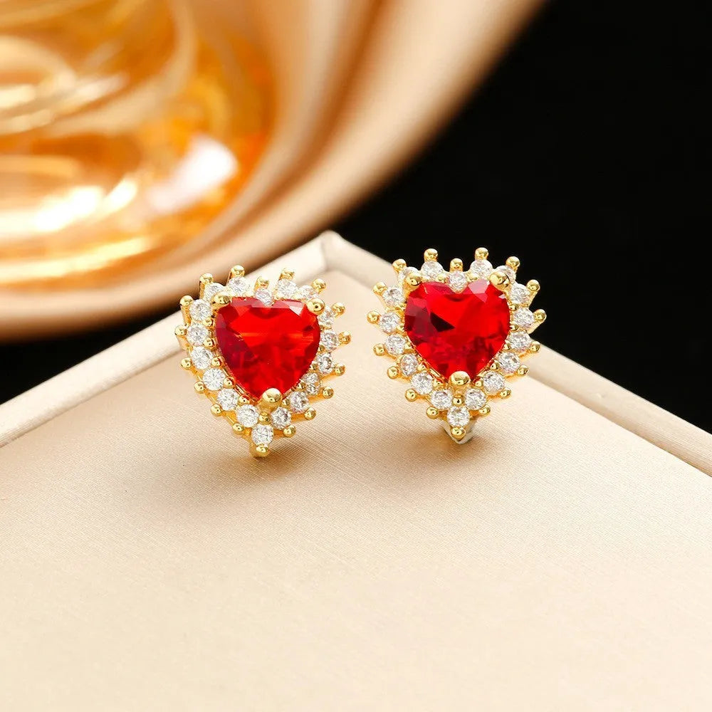 Gold-red heart and flower pendant necklace, earrings, and ring set with gemstone inlay on a titanium steel chain.
