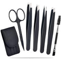 Six-piece stainless steel eyebrow tweezers set with leather case, showing four tweezers, scissors, and a brush.