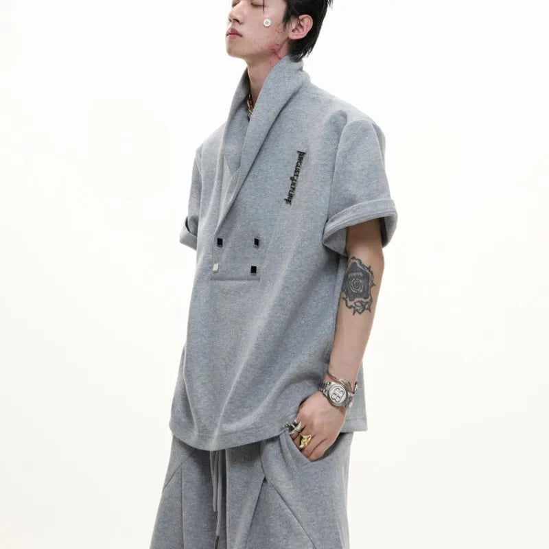 Men's dark grey V-neck padded shoulder jacket with metal details and matching shorts sport suit.