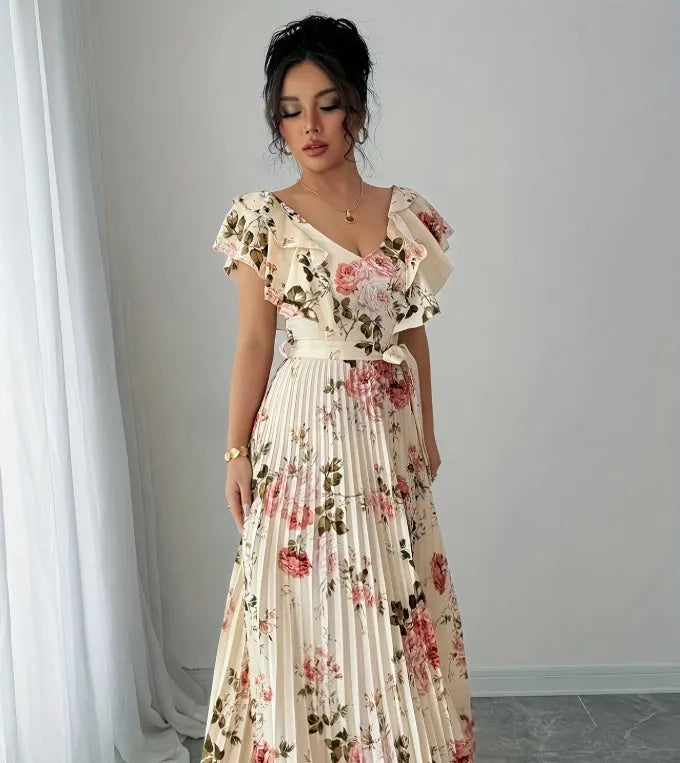 Apricot V-neck floral print dress with ruffled sleeves and a high-waisted swing skirt.