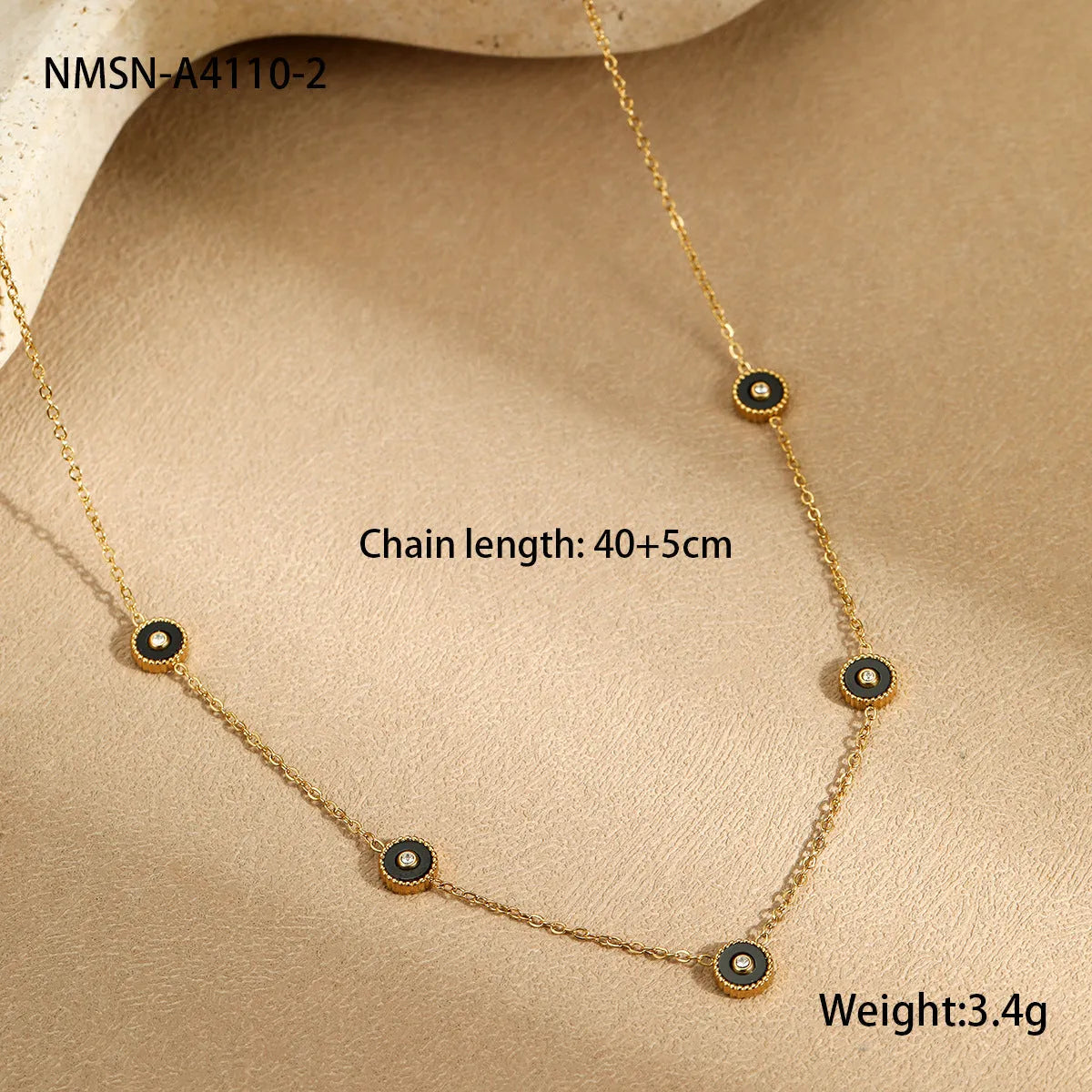 Women's stainless steel bracelet and necklace set with 18K gold plating and geometric design.