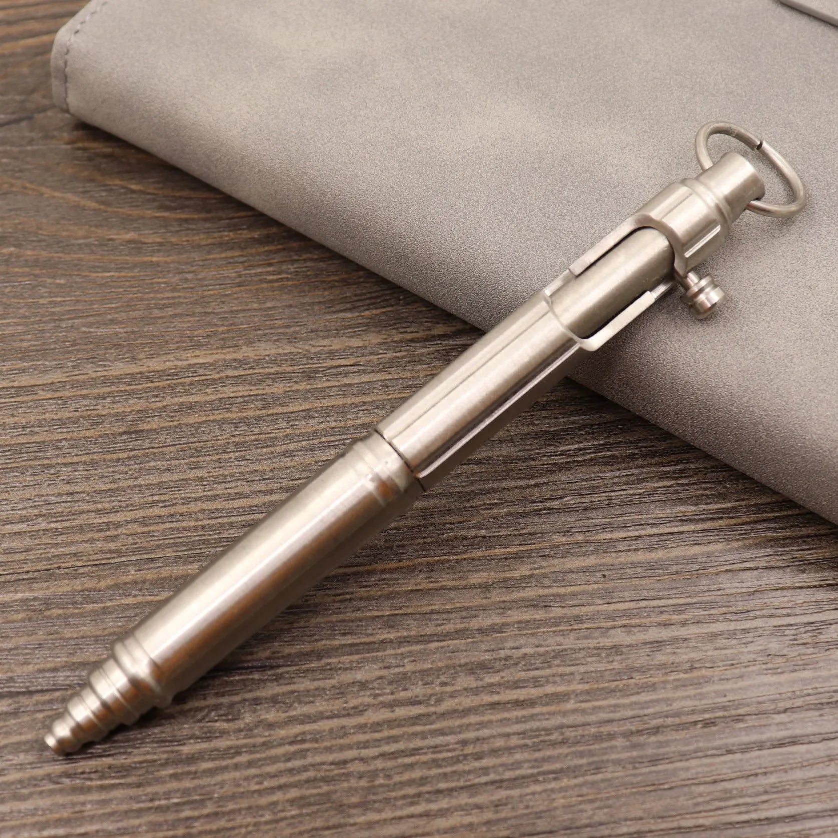 Brass tactical pen with retro colour finish and press mechanism