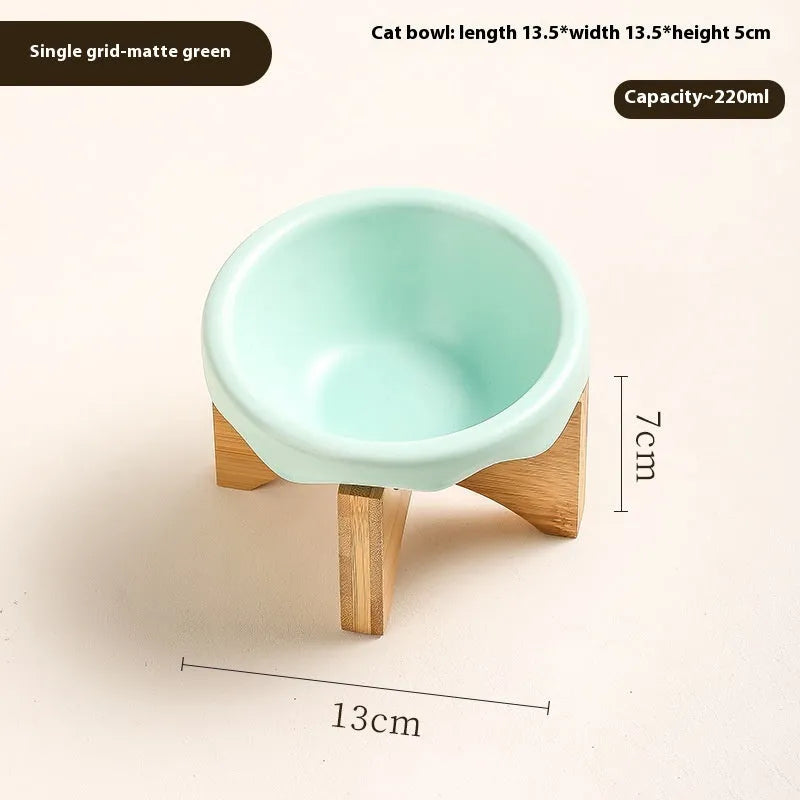 Porcelain cat drinking water bowl in bright red single grid configuration on surface