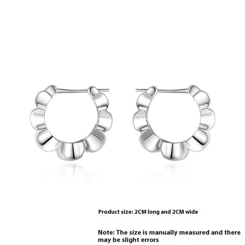 Sterling silver geometric hoop earrings with round design elements and electroplated finish