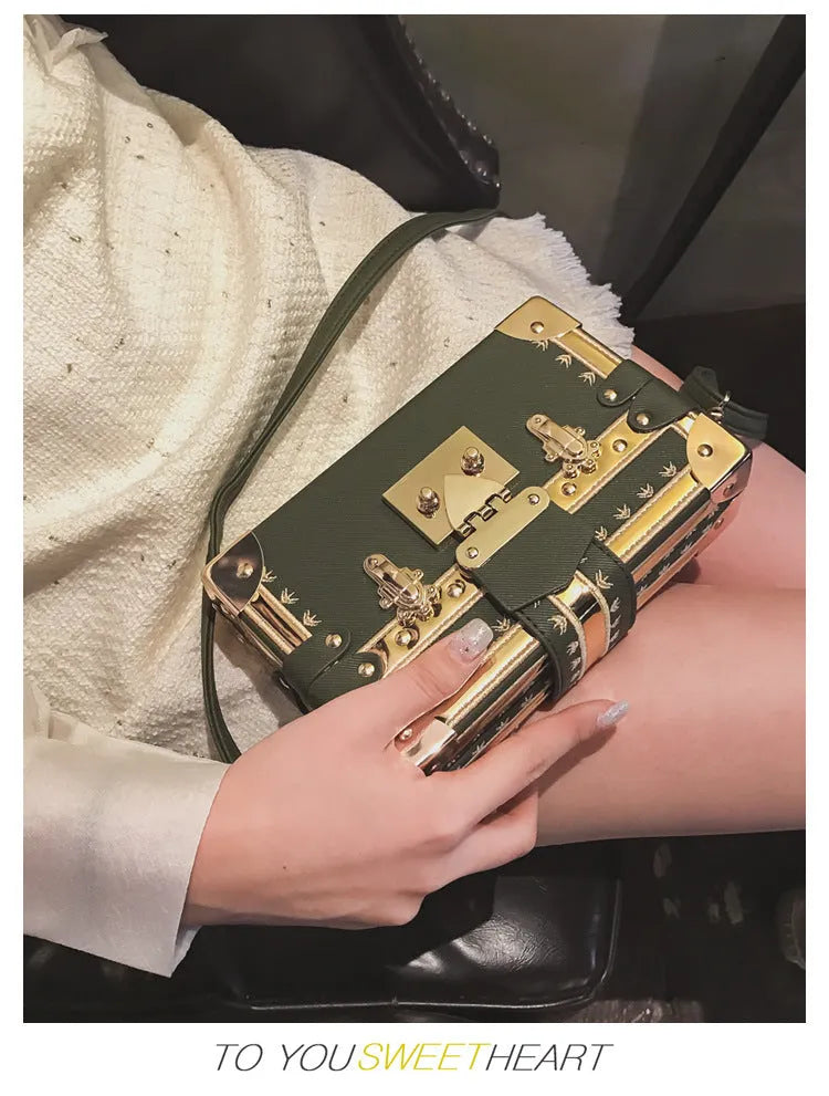 Women's hard-shell PU shoulder and crossbody handbag with hasp closure in black or green.