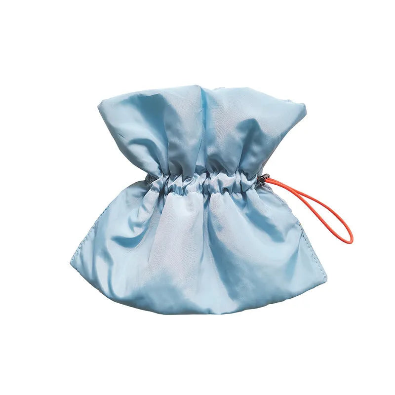 Soft blue adjustable Elizabethan recovery collar for cat on a white background