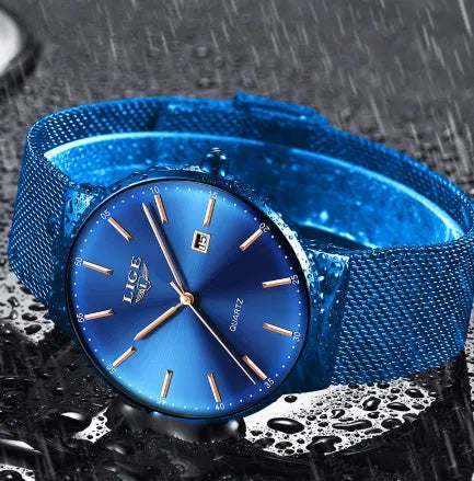 Men's stainless steel wristwatch with a 40mm case shown in black, blue, and two-tone colour variants
