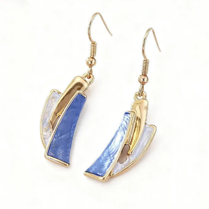 Blue zinc alloy bohemian necklace and earring set with irregular quadrilateral pendants on a light surface