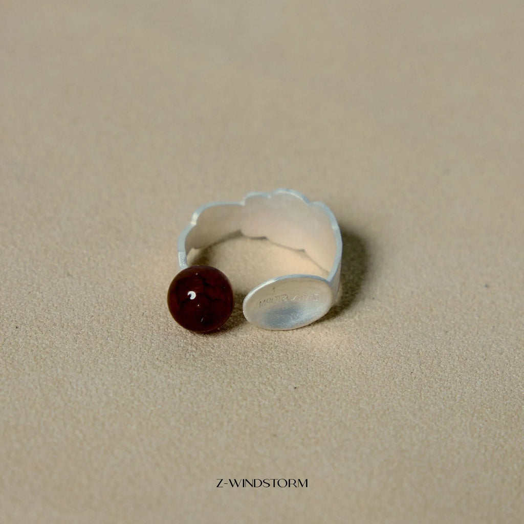 Small electroplated alloy jewellery piece with a diamond shape, shown as a bracelet or ring option.