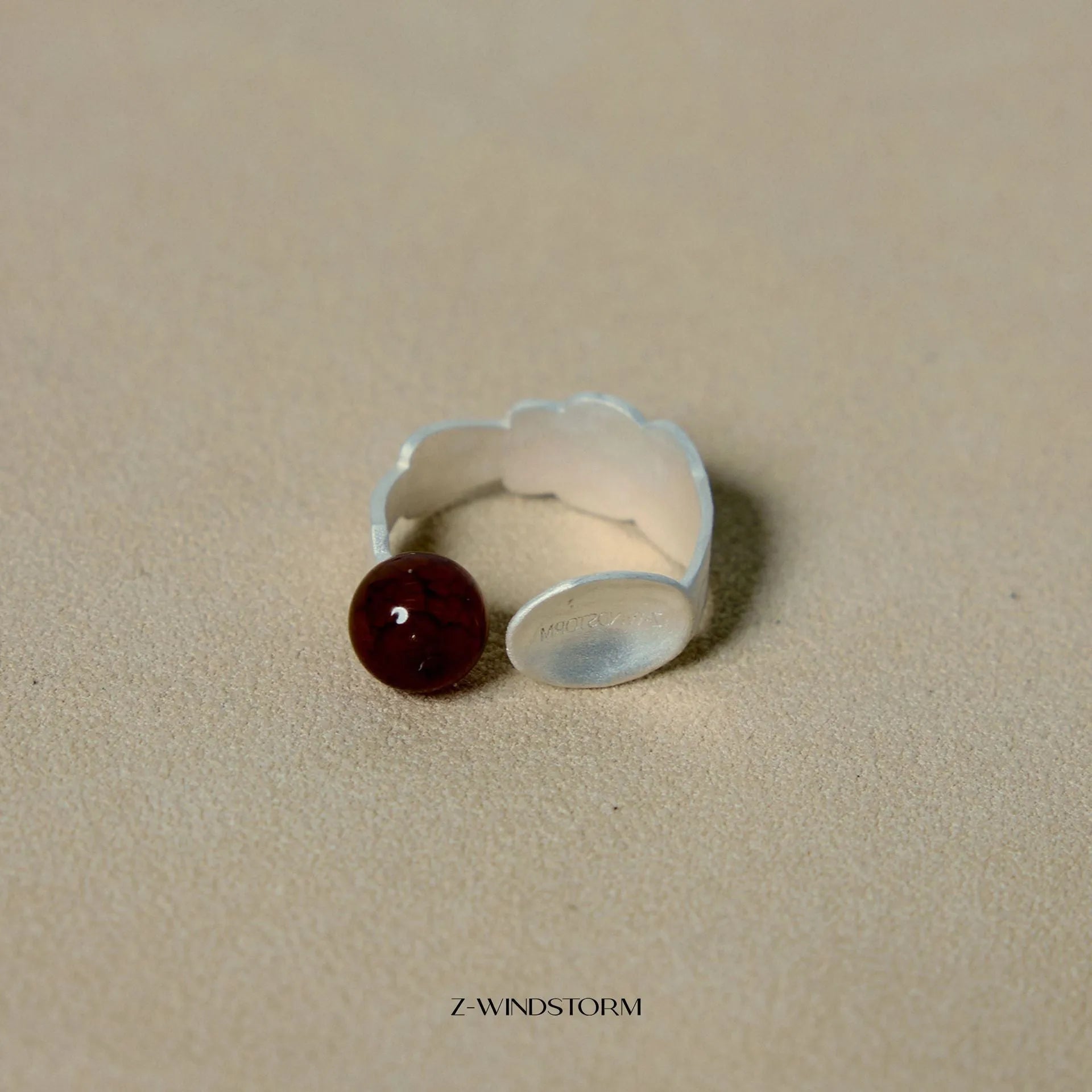 Small electroplated alloy jewellery piece with a diamond shape, shown as a bracelet or ring option.