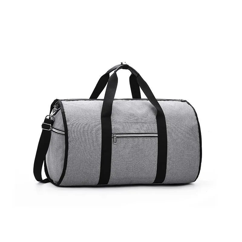 Medium sized cylindrical travel bag in black, made from oxford cloth with a top zipper.
