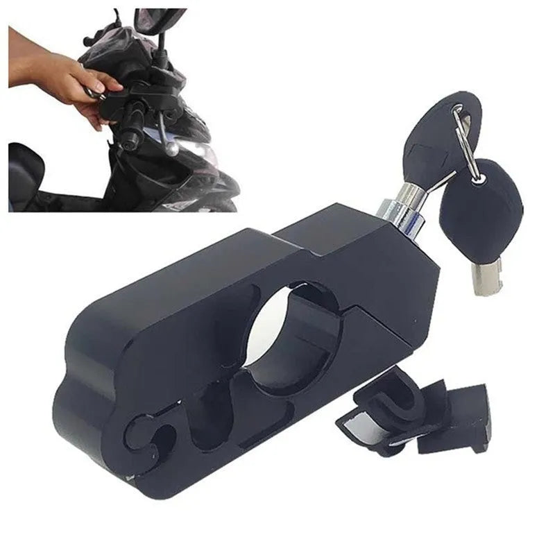 Black motorcycle handlebar lock with CNC aluminium body and stainless steel wire, shown attached to brake lever