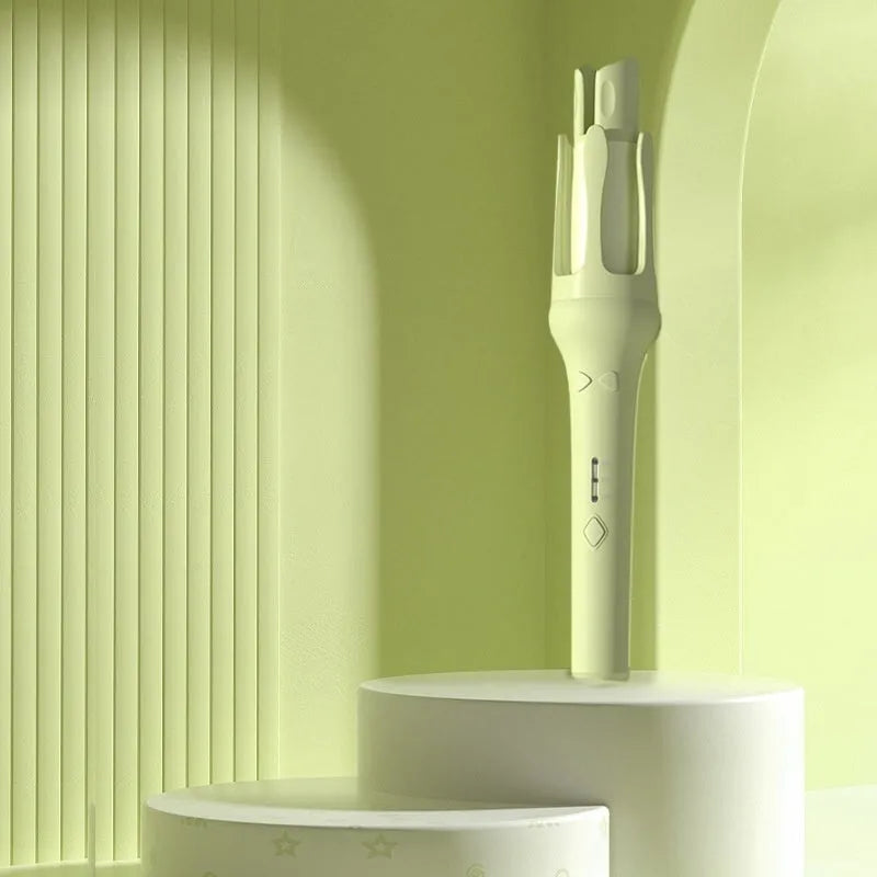 White and pink automatic hair curler with a 32mm ceramic barrel and a US plug adapter on a table.