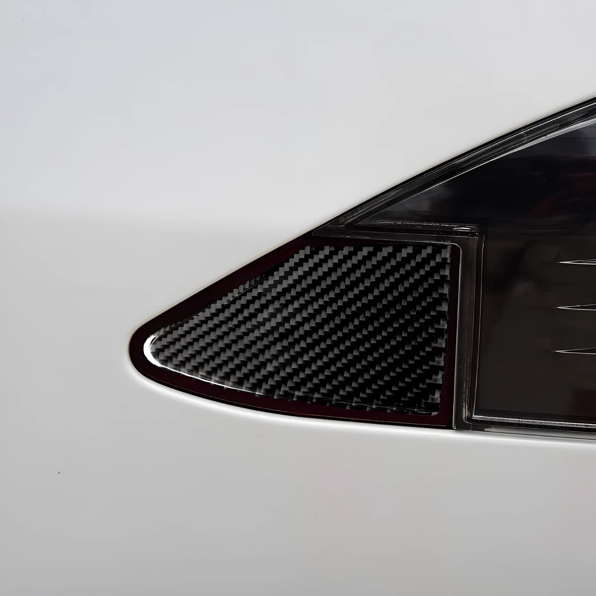 Carbon fibre decorative sticker for a USB charging port panel with 3M adhesive backing.