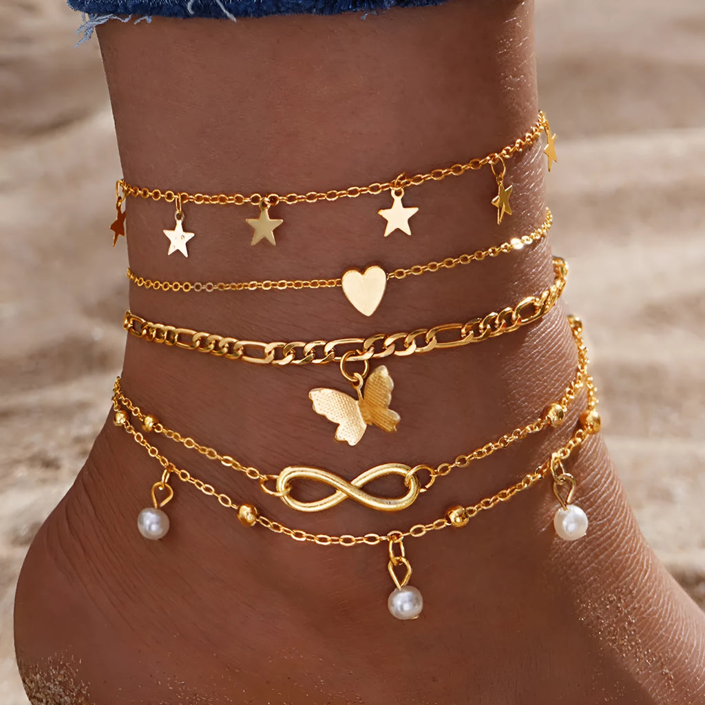 Butterfly pearl heart design four-piece alloy anklet set for women with multi-layer styling options