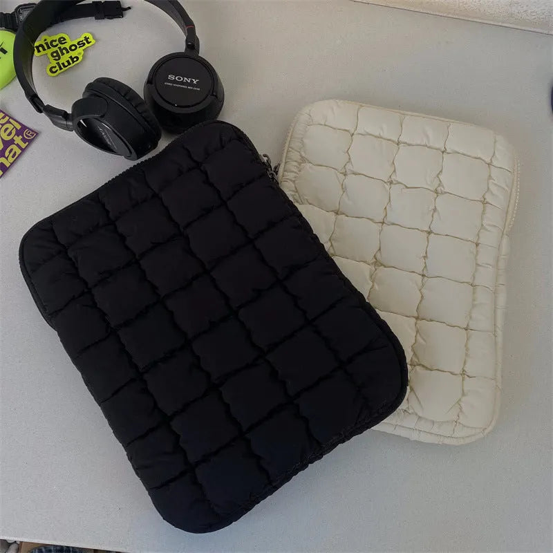 Black nylon laptop bag with cloud cotton padding shown open, sized for a 15.6 inch laptop