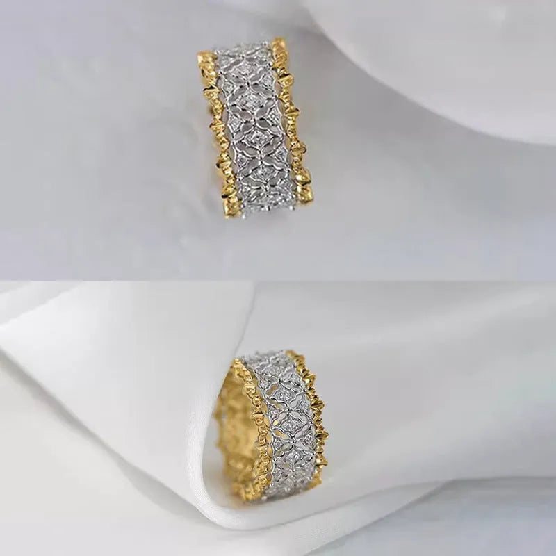 Geometric two-tone gold and silver ring with a round zircon on a copper band.