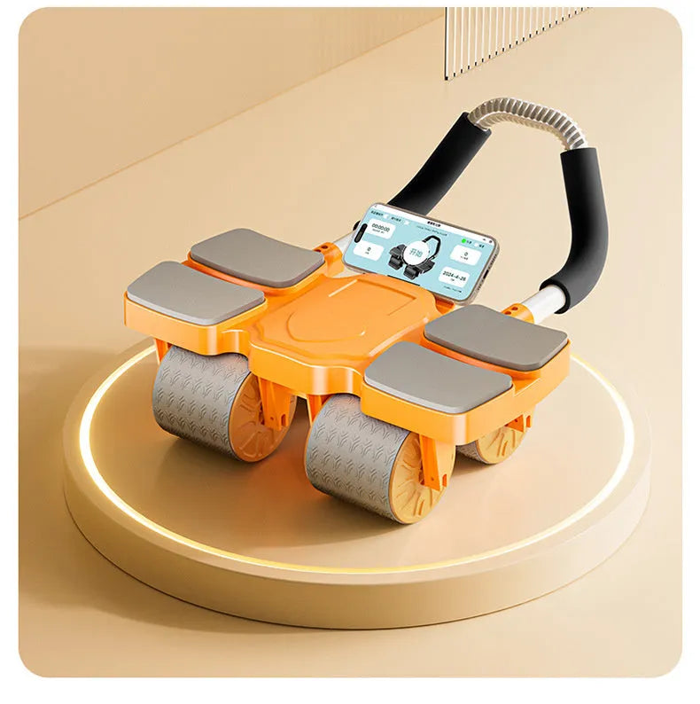 Black automatic rebound abdominal wheel with four wheels and rubber grips on a wooden floor.