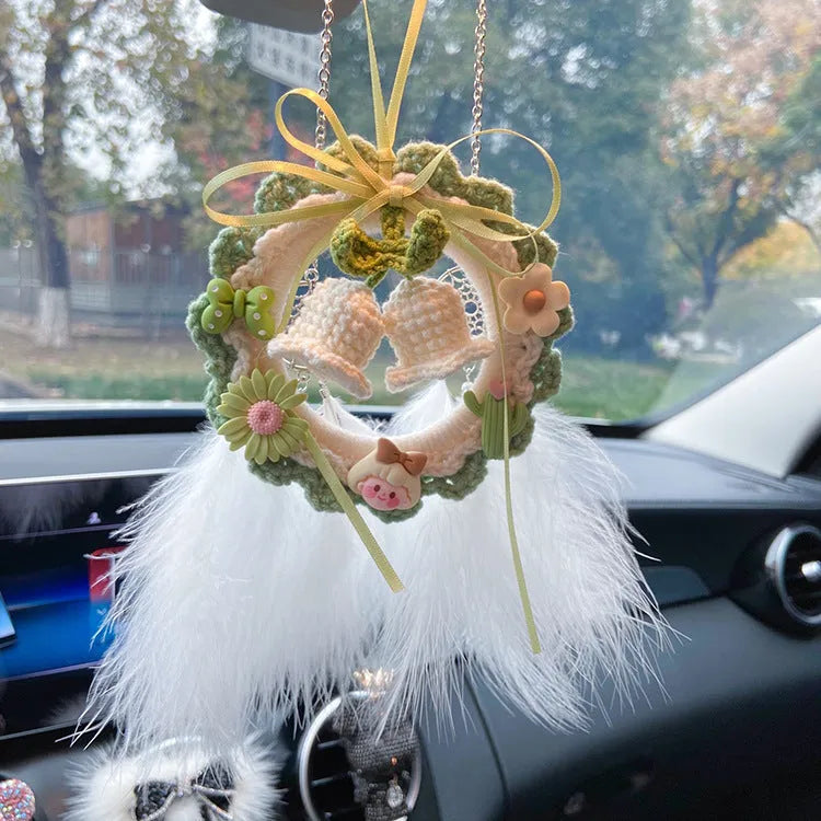 Woven wool bell orchid car pendant hanging from rear-view mirror in green colour option