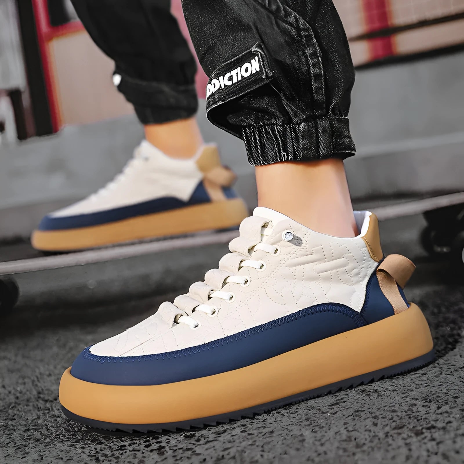Mens black and orange leather sports casual board shoes with synthetic PU upper, PVC sole, and elastic band slip-on style