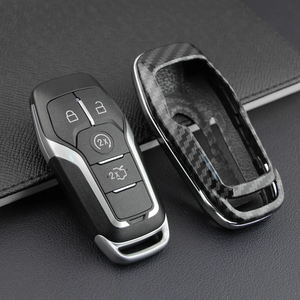 Plastic protective shell for a car key remote, shown in single shell and buckle design options.
