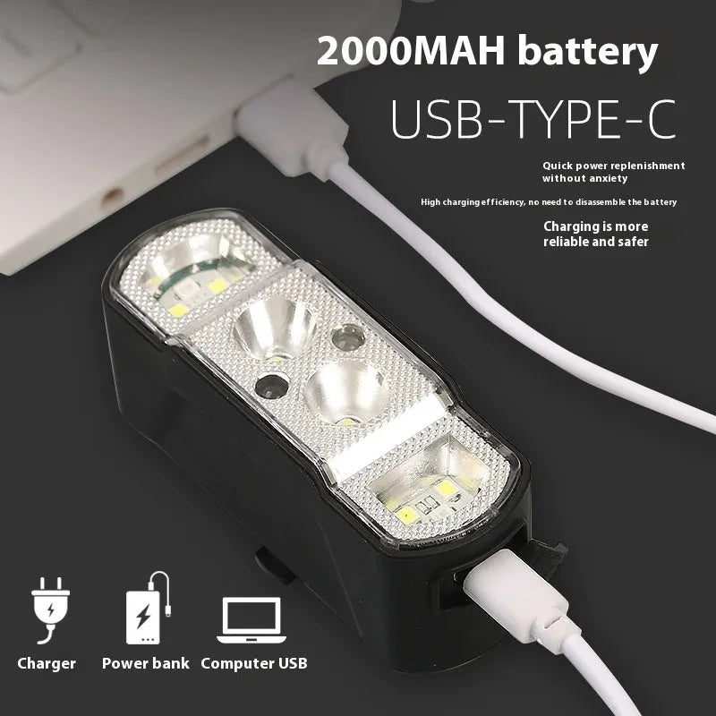 Black bicycle headlight with wave induction control and 350 lumen LED for mountain and road cycling