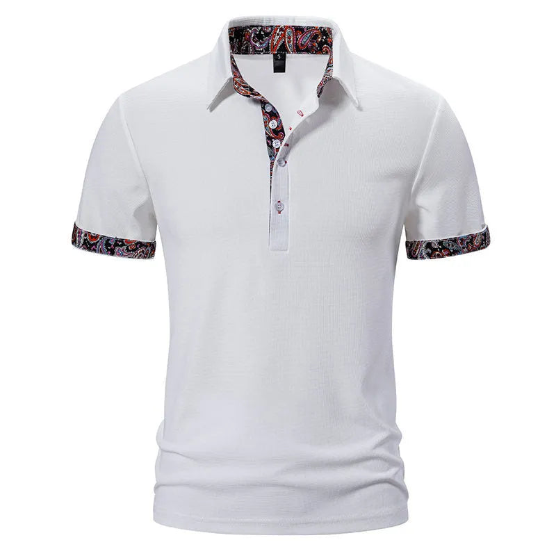 Men's navy blue polo shirt with colour block stitching on the chest and short sleeves.