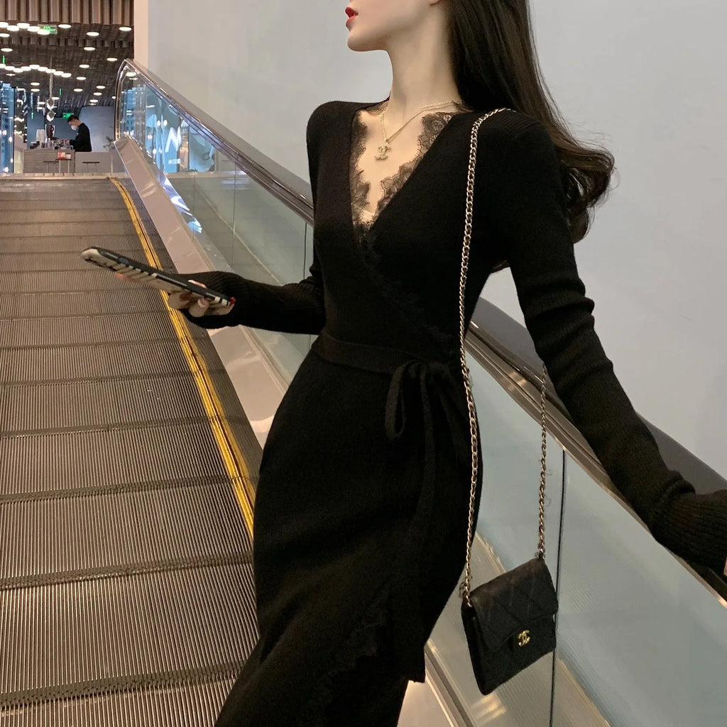 Women's solid black slim fit wool princess dress skirt on a hanger.