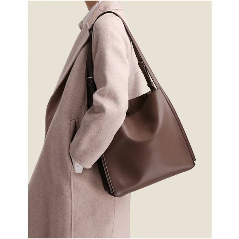 Genuine leather large capacity bucket shape women's handbag in brown with double shoulder straps and slit pocket