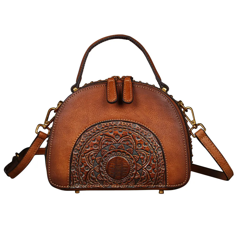 Vintage suede cowhide leather handbag with multiple interior pockets including ID and phone slots.