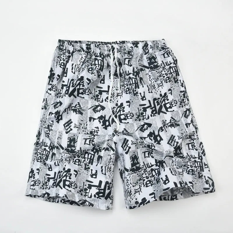 Men's floral printed swimming trunks in polyester with five-point design for beach and pool use