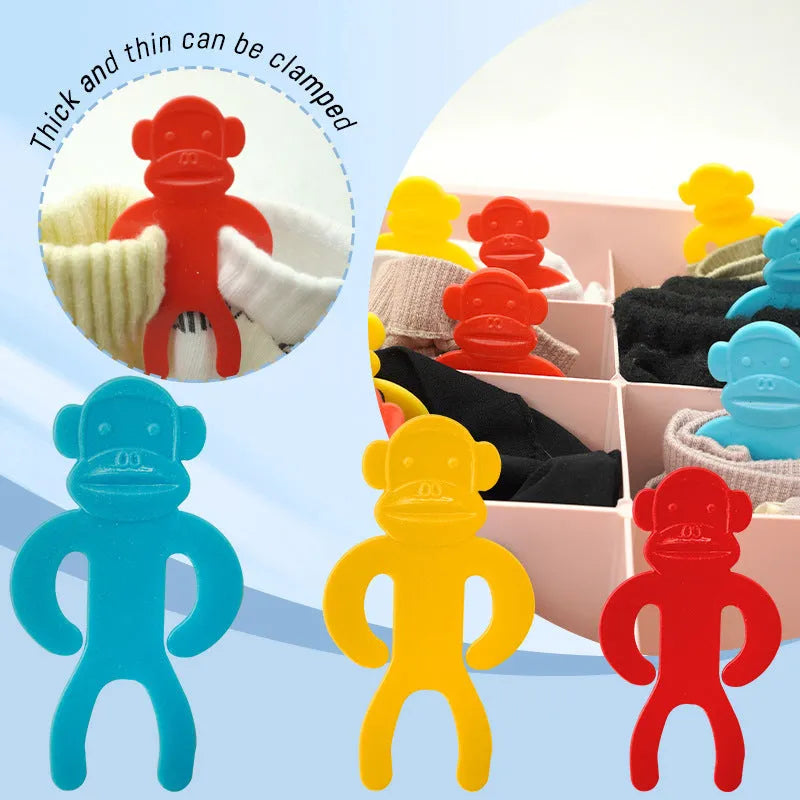 Plastic socks storage clips in blue, yellow and red colours for machine wash laundry organisation