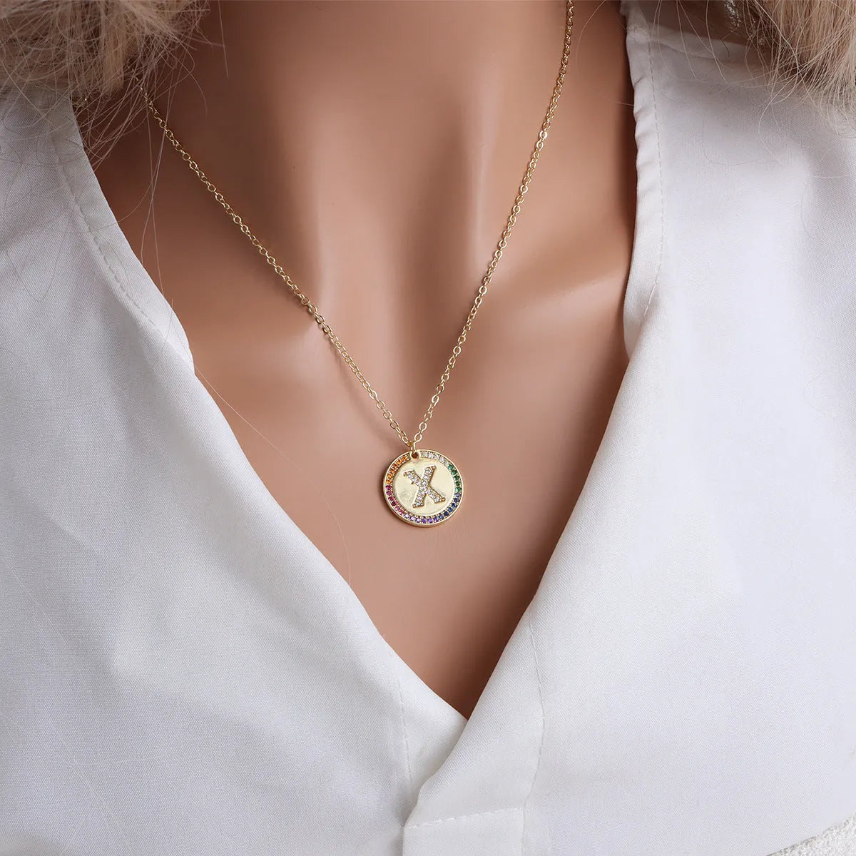 Gold English letter round pendant necklace with colourful crystals on clavicle length chain